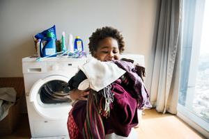 Sept-2023-Blog-family-routines-girl-laundry.jpg